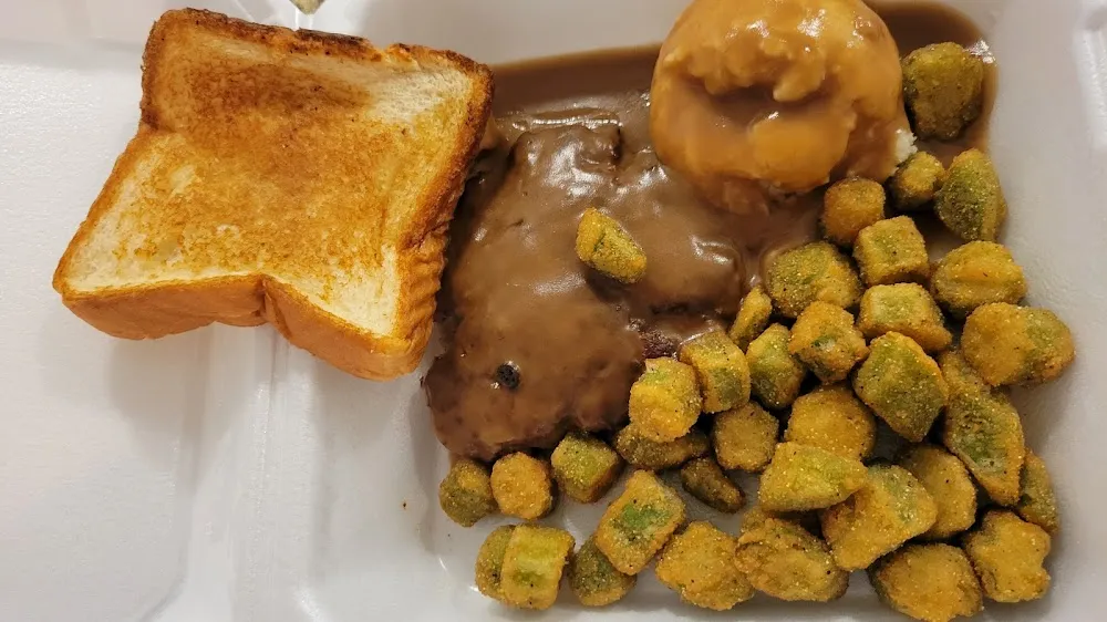 Country Fried Steak with Gravy Plus a Side of Fried Okra Mashed Potatoes and Garlic Toast